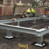 Image of steel frame construction for new house on screw pile foundation.